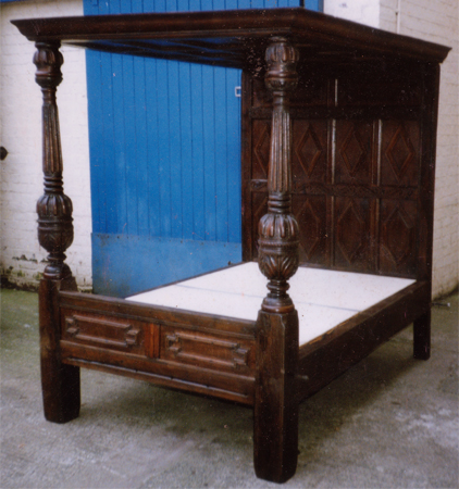 Restored four poster bed