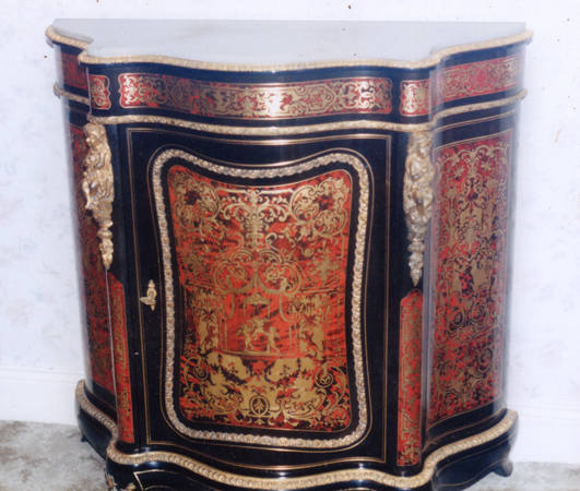 Photo of restored Boule cabinet with intricate pattern